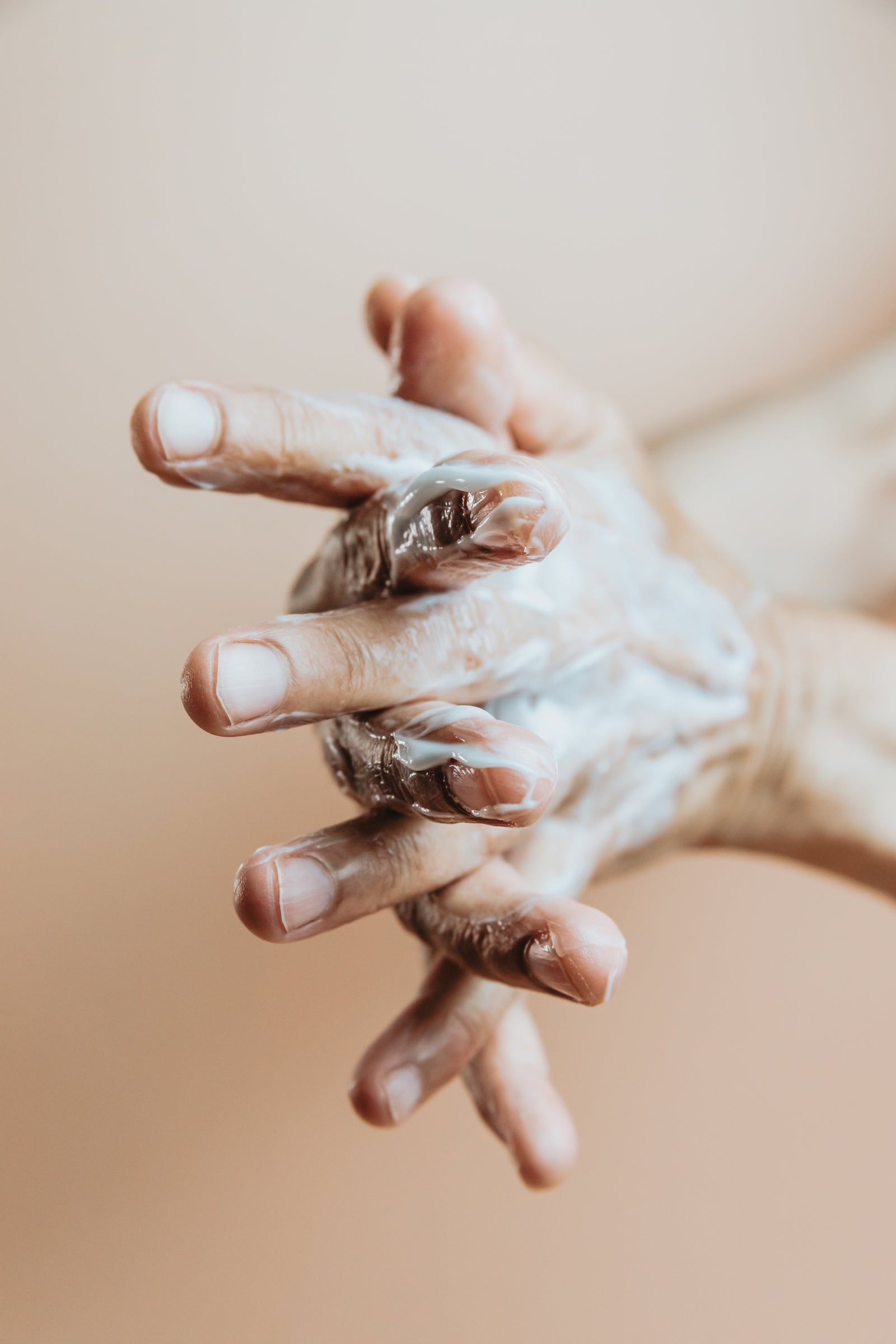 Pressing the serum in with clean hands